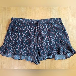 EUC Topshop Black rose print ruffle shorts
